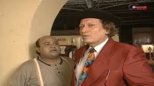 After a series of rather disappointing movies, Vijay Anand was back to form, with the detective TV series Tehkikaat, that also had Saurabh Shukla as his assistant.