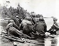 By Jan 1943 his battalion was part of “Warren Force” heading north along the Papuan coast towards almost 10,000 Japanese troops dug in securely at the Buna-Sanananda Beachhead area.The American advance become stalled, along a narrow stretch of beach between sea and fetid swamps.
