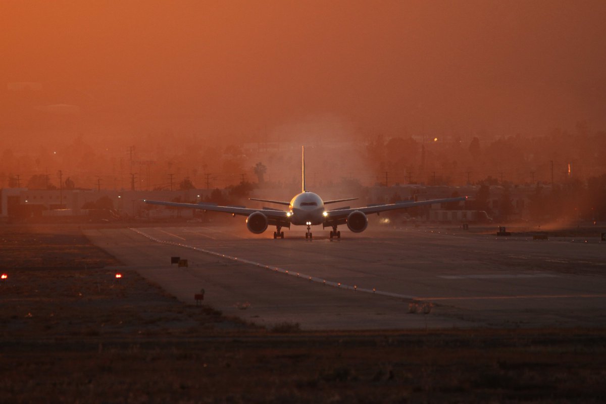2/3777 N557CC freighter conversion landing on  #SBDairport runway 06 earlier this evening against a setting sun after doing a flight test.No crop, no color corrections #aviation  #AvGeek