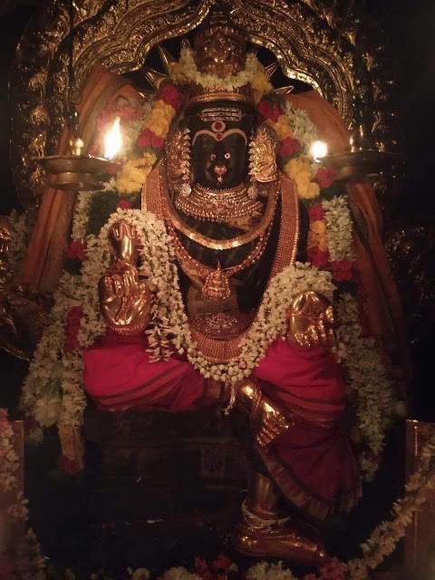 2.Imposing 5Ft Goddess Lalithambikai is beautifully seated on SriChakra Simhasana in AbhayaHastha mudra.On VIJAYADASHAMI ,plantain leaves are spread in Sanctum over 15ft*5ft area & divided into 3 sections.1st section closest to Goddess ,100 kg of sweet Pongal/Rice is spread