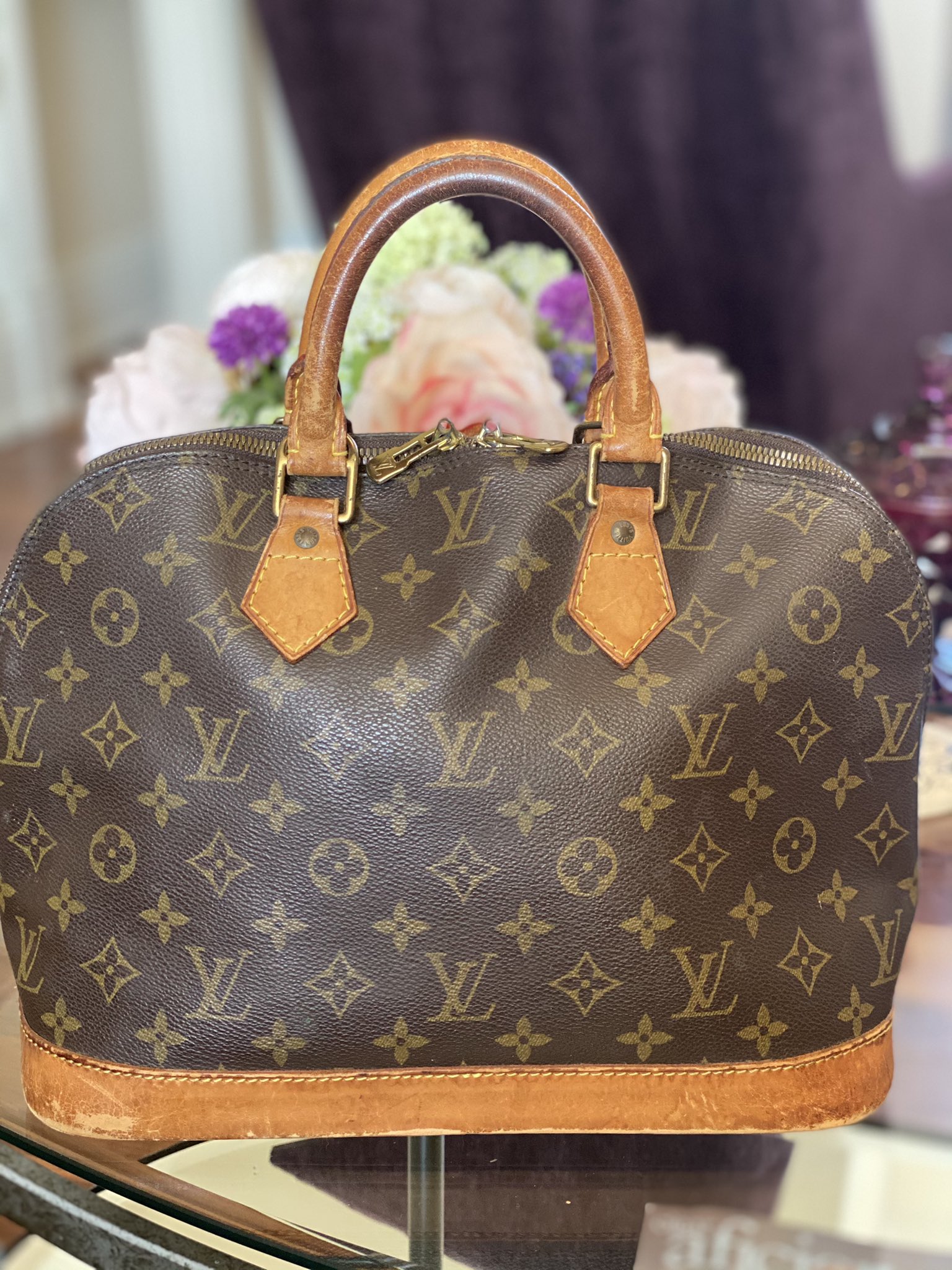 reLoved handbags on X: Here's a vintage Louis Vuitton Alma that I'm  redoing in black. Just putting the finishing touches on ❤️   / X