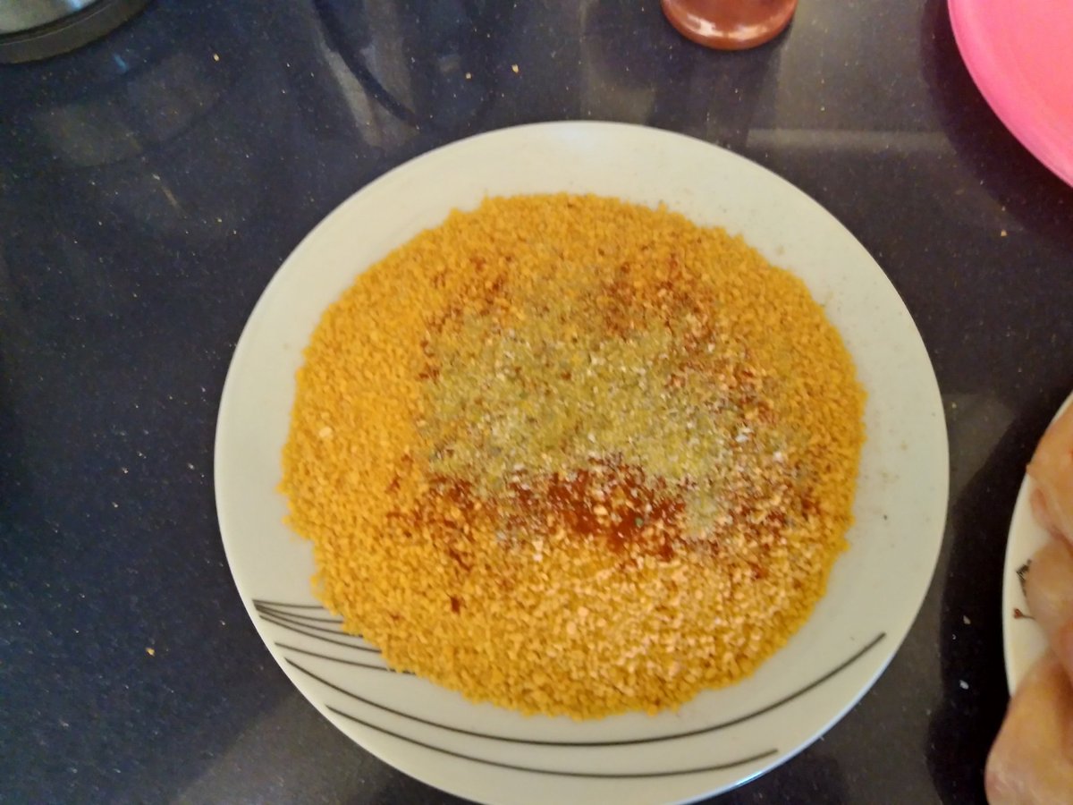Next.. Bread crumbs for the crust. You can add whatever spices you would like. I use red paprika and grill herbs..
