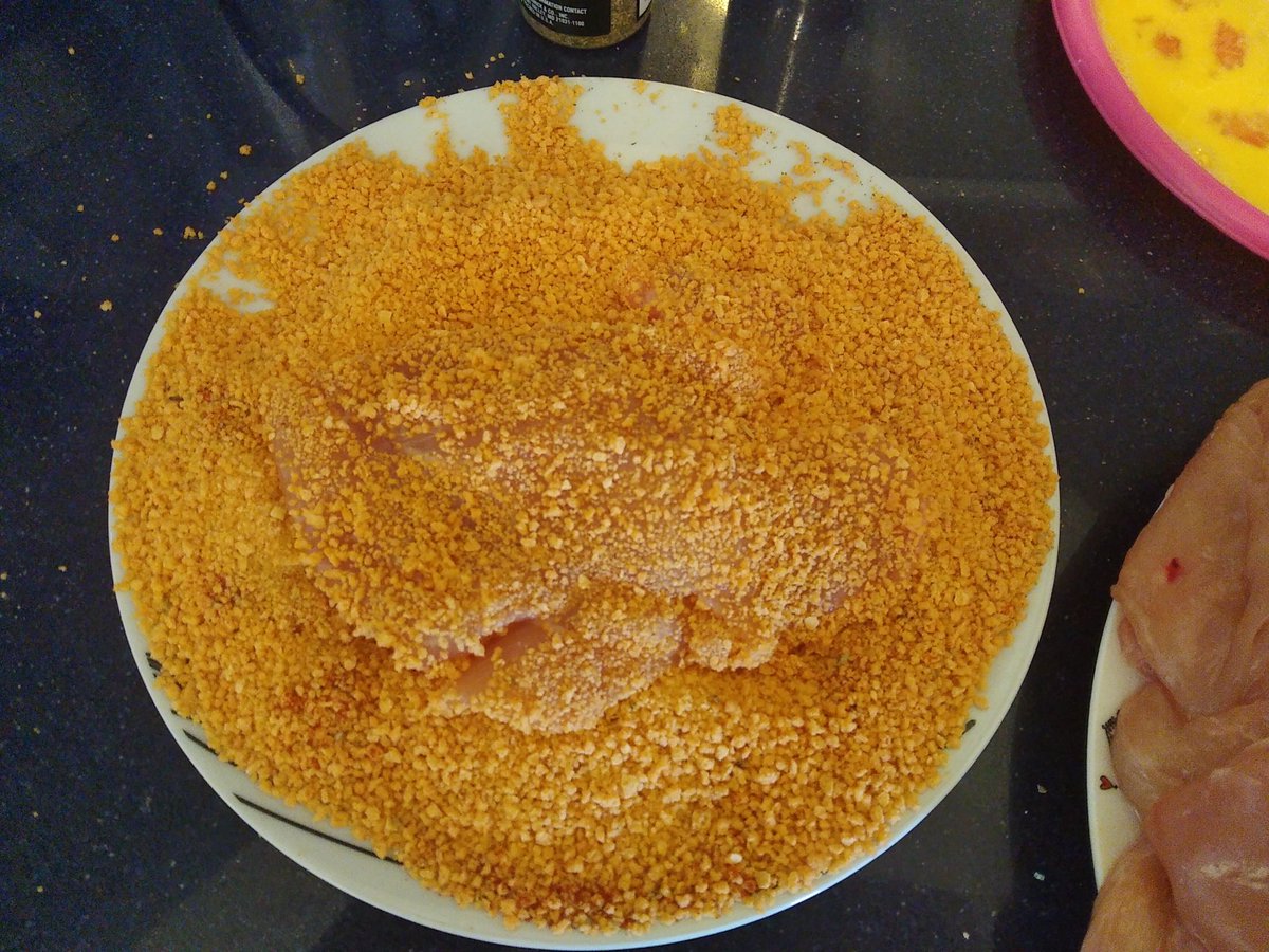 There are 3 stages to the process.1. Take the chicken breast and coat it on both sides with bread crumbs.