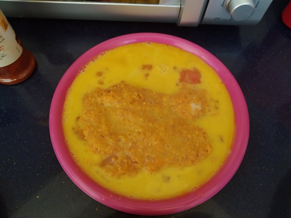 2. Dip the breast in egg on both sides..