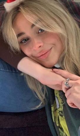 Plus sabrina has bangs now