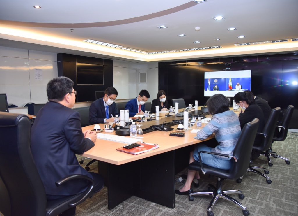 MFAThai's tweet photo. PS Thani reaffirmed to enhance cooperation with #Myanmar in particular public health, cross-border issues, post #COVID19 economic recovery, and closer cooperation on sustainable development in a virtual meeting with H.E. U Chan Aye, PS for Foreign Affairs of Myanmar today. https://t.co/GjzWEWFSPa