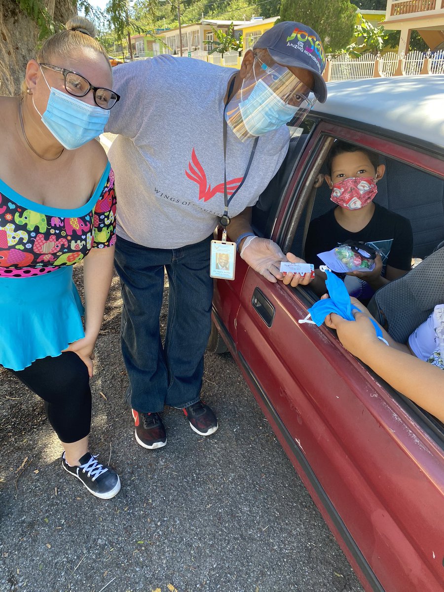 Buffalo Fire Dept Angel Gauthier with Wings of Compassion in San Juan, Puerto Rico handing out AT&amp;T masks and hand sanitizer donated from the AT&amp;T Sheridan Drive Store.  <a href="/DennisJFosterJR/">Dennis Foster</a> <a href="/DFraser0107/">Don Fraser</a> @CamisBUFF @oliveiramikeO