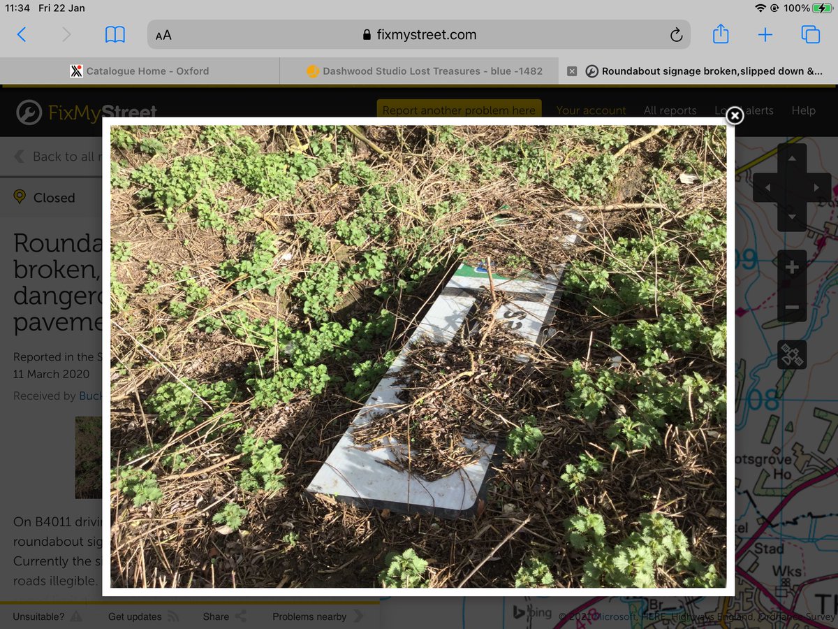 Pamsplants1's tweet image. @tfbalerts please repair the roundabout sign on B4011. This was reported to fixmystreet 10 mths ago. Vertical upright still in position. All panels on ground by upright. It’s unsightly. It’s near petrol station/hotel.