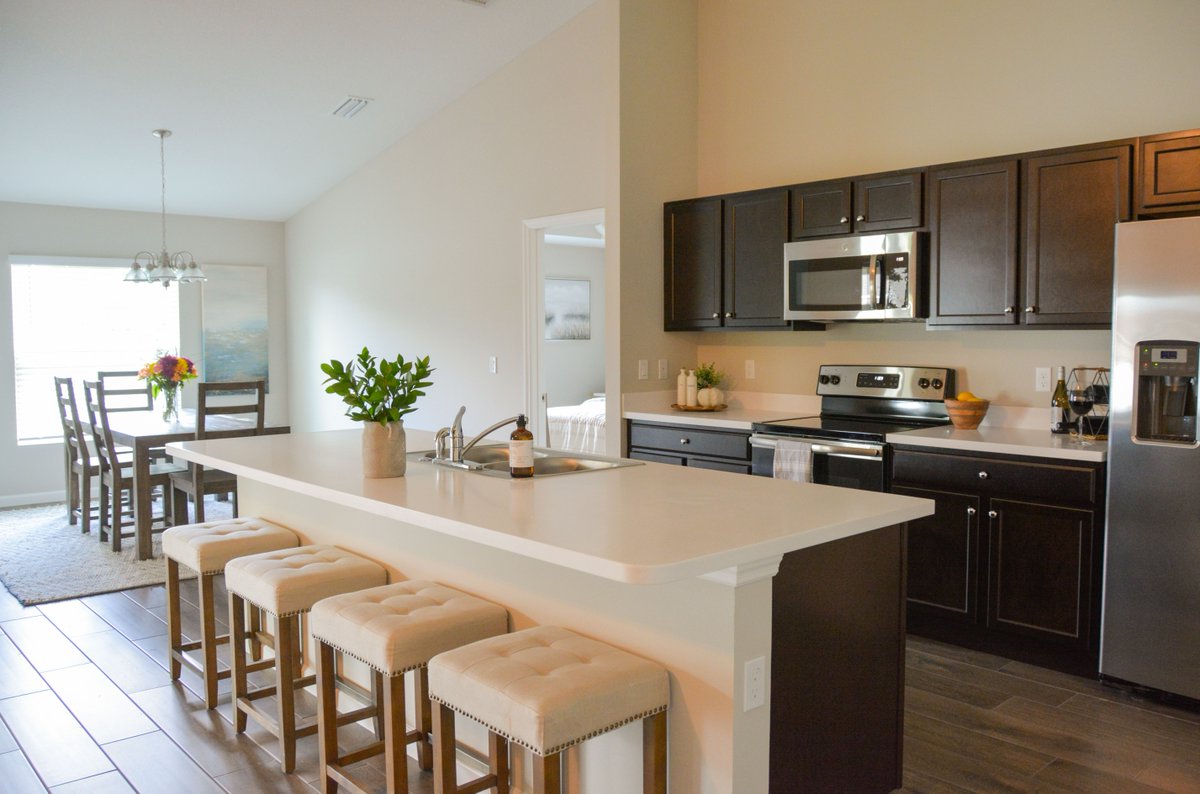 SynergyHomesFL's tweet photo. Pull up a seat at the island of our #ElementSeries model home in #PortSaintLucie! If you've seen us online but wanted to look at and feel the materials we use in our Element Series homes, you can come by our model home at any time to see paint swatches, flooring types, and more! https://t.co/pqMflD85aS