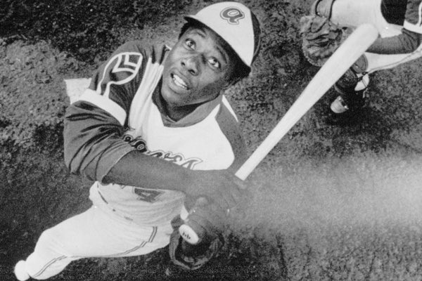 Look at this glorious photo.From coming up swinging the bat cross handed – as a righty, his left hand was above his right hand on the bat- through the Negro leagues and up until he became the Home Run King in Atlanta, Aaron was by all accounts a gentle giant. That’s not fair.