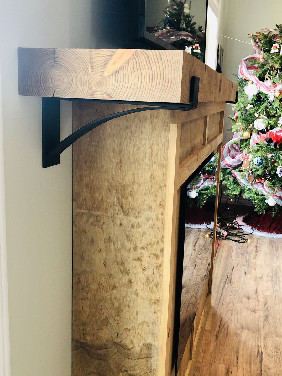 aaronmacq's tweet photo. A recent project completed and installed over the holidays. Made to order mantle brackets made for this electric fireplace. #custombuilt #metalfabrication #steelfab #tigwelding #blackmetal #mantelbtackets #customfireplace #NBmade #charlottecounty https://t.co/TeEtG9F6Fa