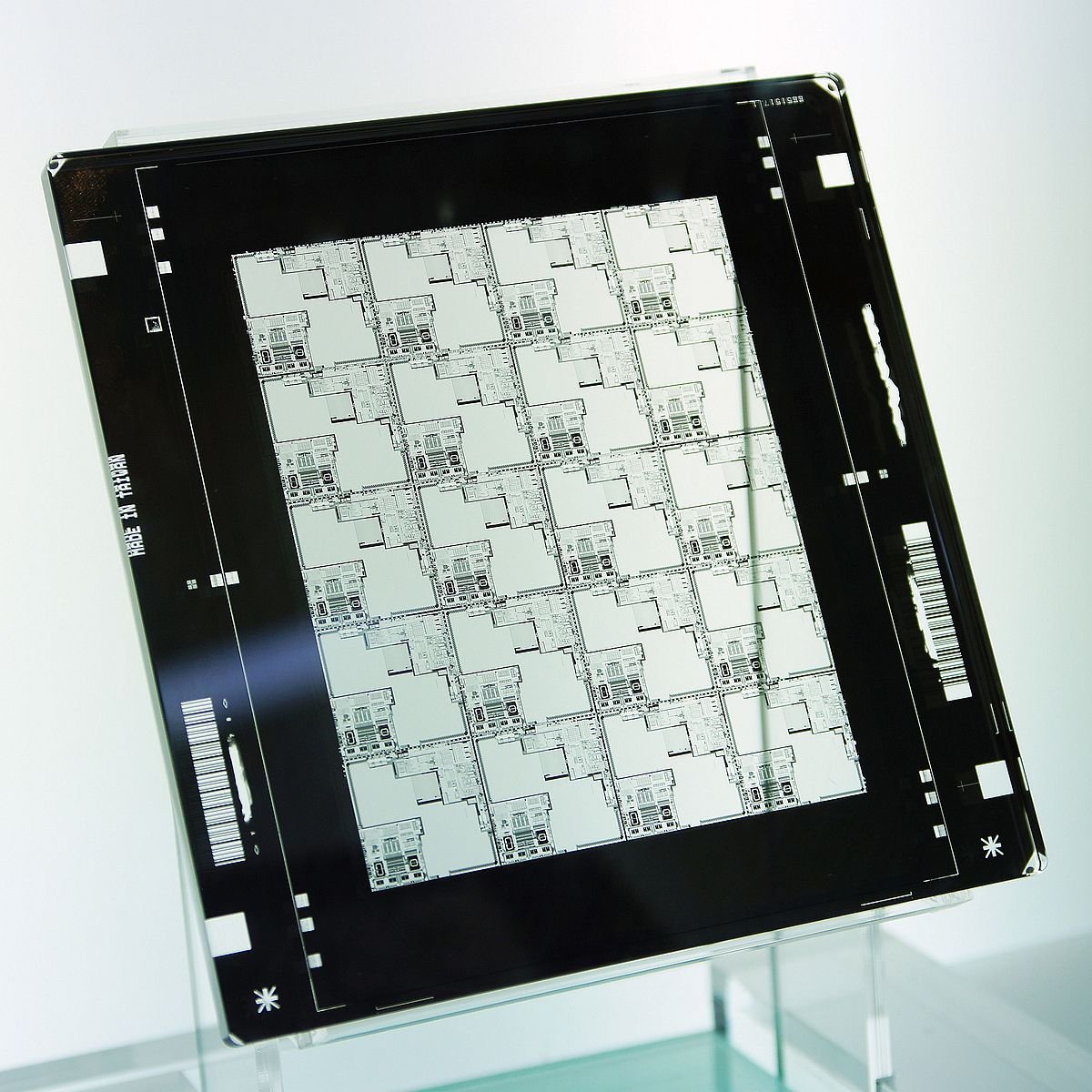 a mask contains a very precise set of images that form connective wiring and other features on a chip. masks are part of the photolithography process that transfers the pattern to the surface of the silicon.