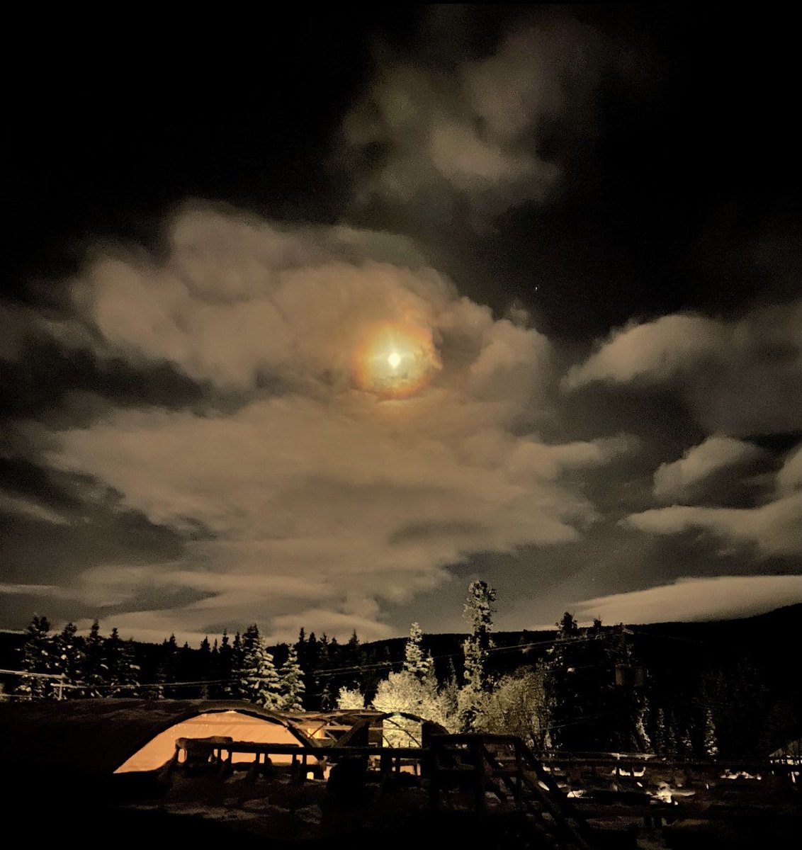 icywaterscharr's tweet photo. This photo was taken at 8:30am on the last morning of 2020.  In a year that brought stress and changes to many, we were thankful to come to work each day to enjoy peaceful views such as this one of the moon overlooking our tank farm. #Yukon #fishfarming #aquaculture #sustainable https://t.co/P6HhTdVXAF