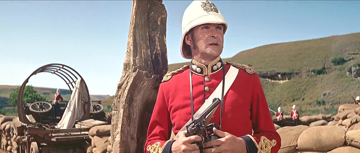 In Cy Enfield's Zulu (1964) Lt. John Chard R.E., Officer Commanding Rorke's Drift is seen here holding a Webley Mk VI chambered in .455 Webley. This is not quite the right sort of revolver as the Mk VI only entered service in 1915.  #History  #Zulu  #ZuluWars1/