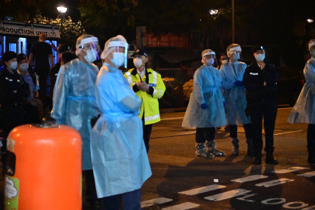 We journalists were pushed back into a convenient store and got surrounded by police ...