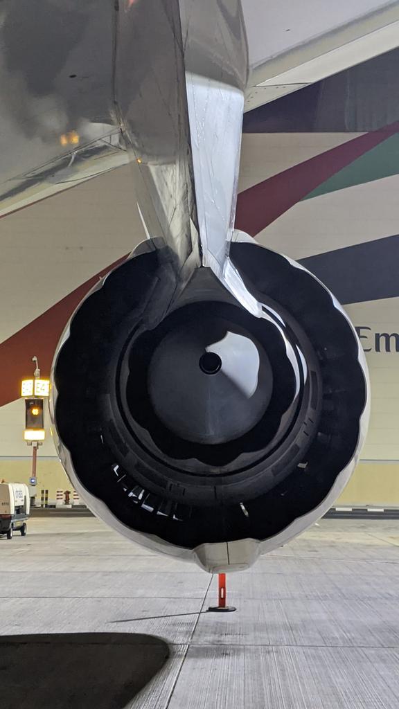 On the B747-8, both the nacelle and inner core engine nozzle utilize a chevron design. Not only is it cool looking, its purpose is to reduce noise.