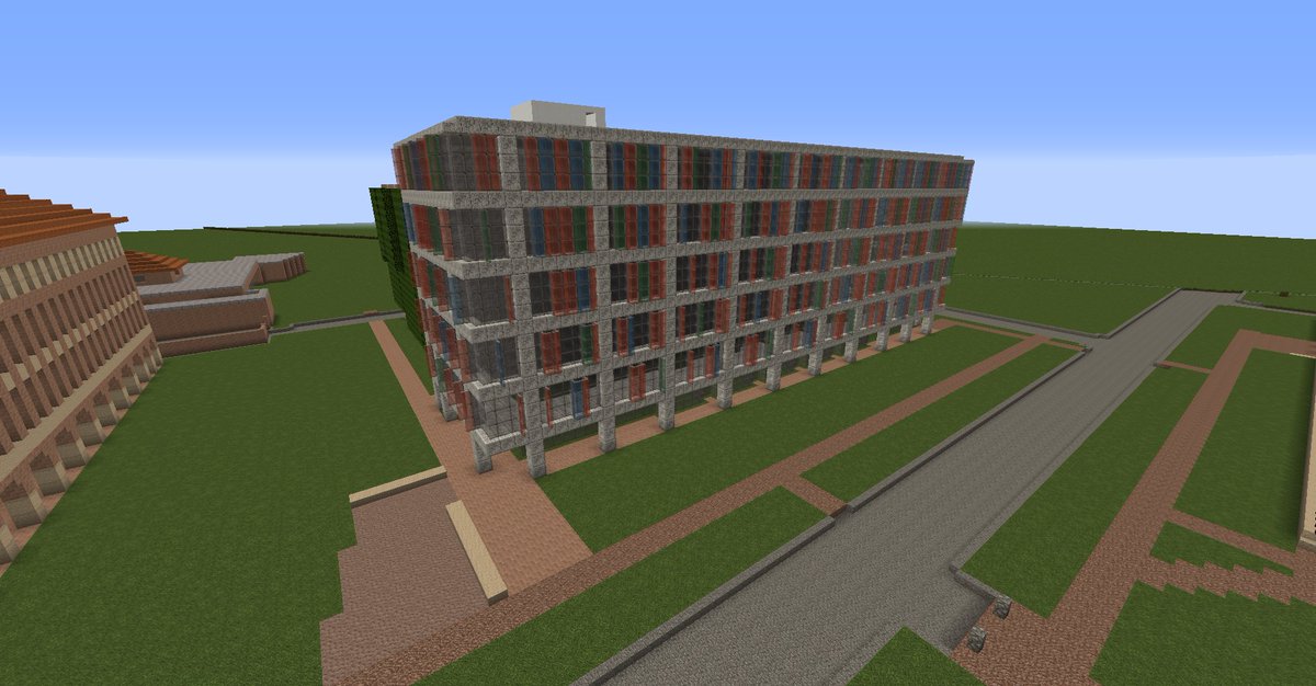 minecraft_rice's tweet photo. Cambridge office building with lots of *color* and attached parking garage, 2018 https://t.co/wjksphlq40