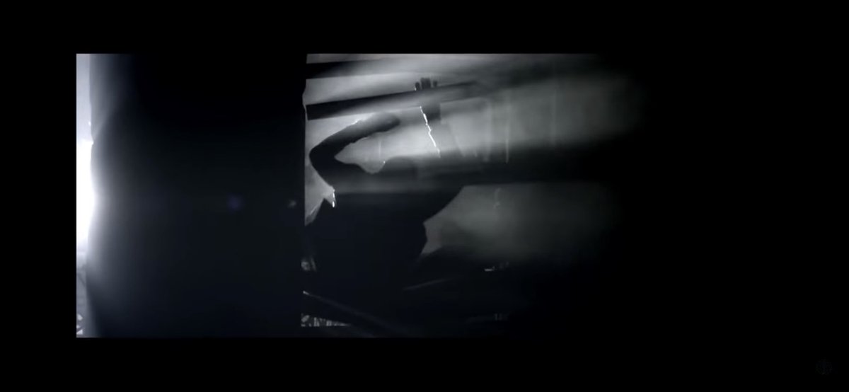 After missing the punch, Cudi loses balance & is then attacked by the demons before being pushed back against a wall & thrown through wooden planks.