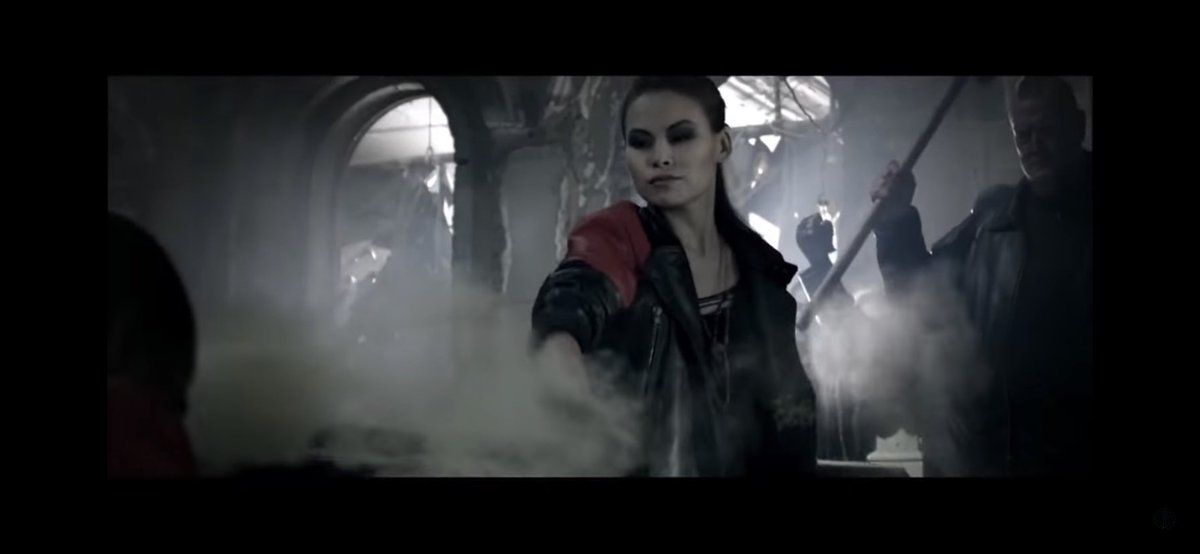 After taking the demon down, a woman throws dust into the eyes of Cudi, blinding him when he’s at his most vulnerable. The woman represents all of his past relationship struggles coming back to him & ruining him, using dust as a way to stop him from regaining peace within himself