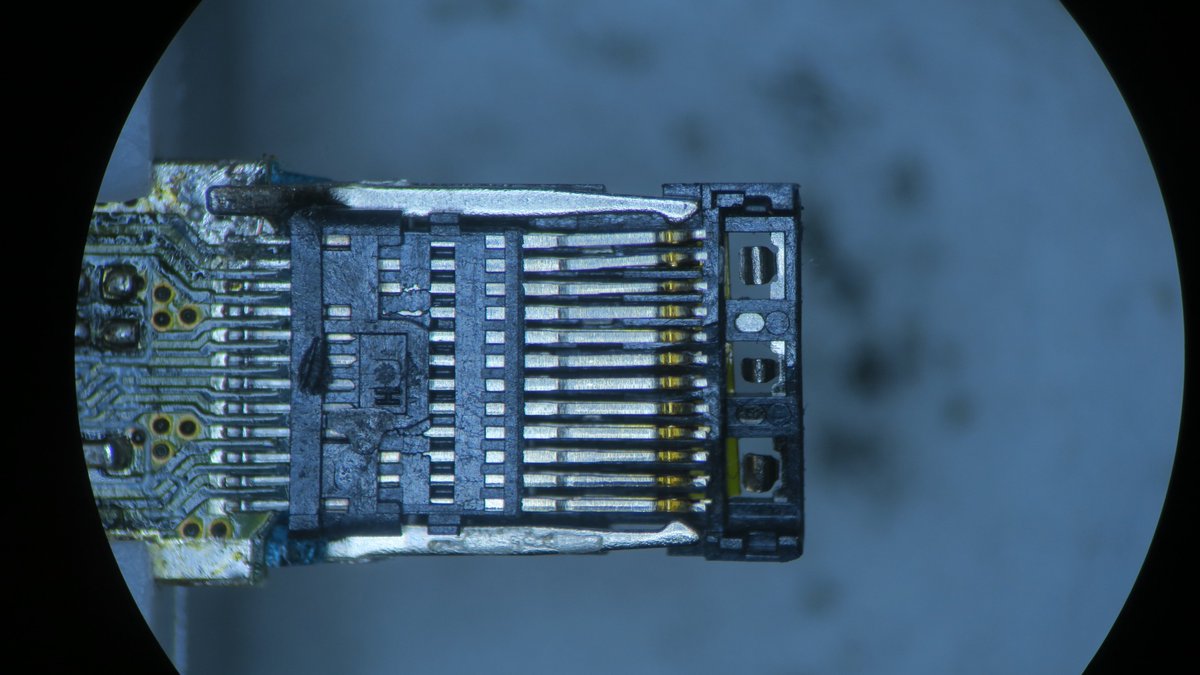 The top and bottom covers of the plug come off just like that, it was the metal shield holding them in place. With those off, we can see all the tiny metal springy pins that mate with the pads in the Receptacle.