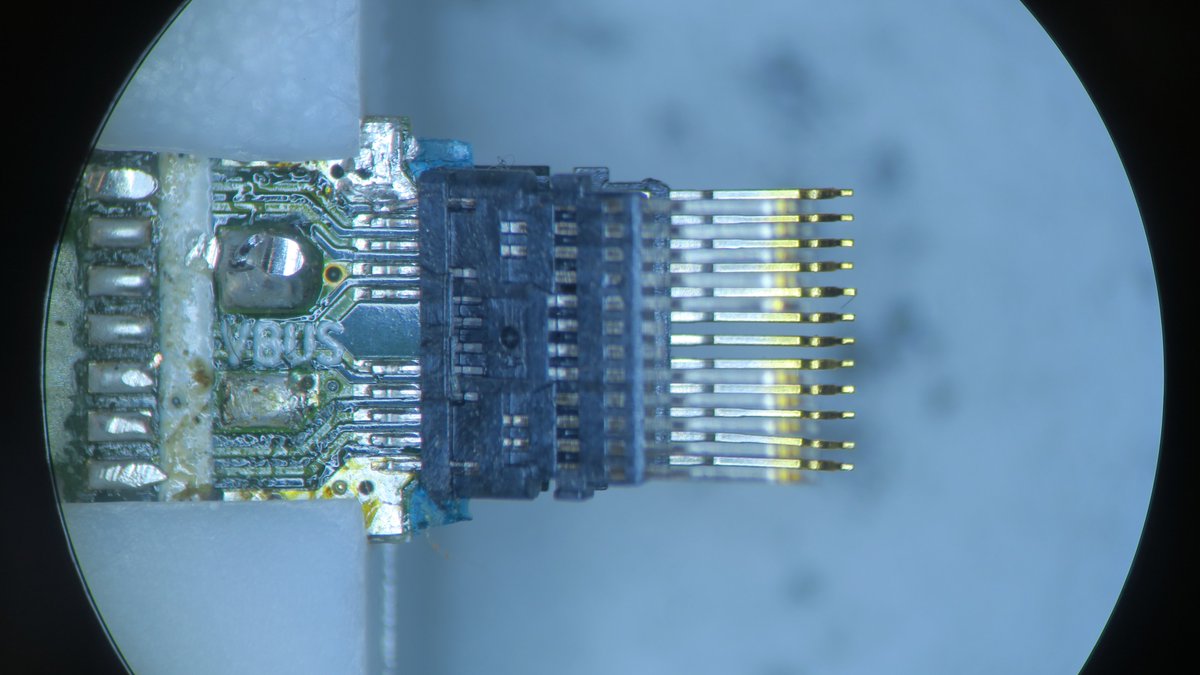 And lastly, we can remove what is left of the plug off the PCB, two separate parts, nearly identical except one side doesn't have the USB 2 data pins as mentioned previously.