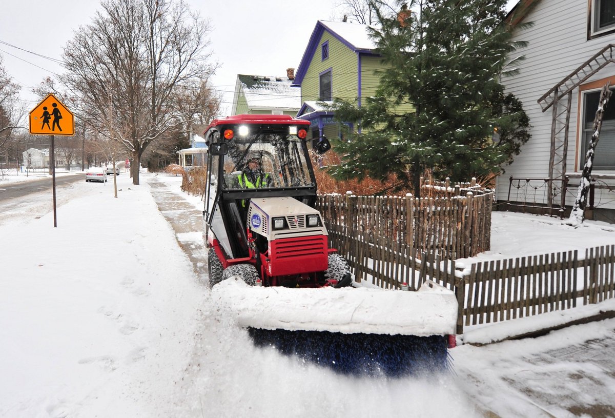Ann Arbor's Water Hill neighborhood operates SnowBuddy, a volunteer-run and funded service which clears all sidewalks after a snow. Residents there find the service transformative, but scaling a volunteer service like this up citywide would be impossible.  #a2council