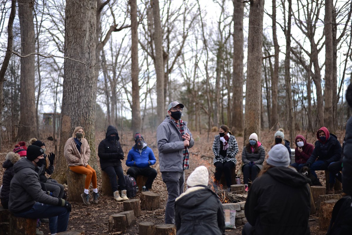elonuniversity's tweet photo. President @ElonConnieBook joined #ElonEd Assoc. Prof. @scomorrison's #COR424 #NatureAwareness class at Loy Farm yesterday afternoon. Seated around the fire, they discussed topics ranging from understanding the intelligence of nature to finding growth in uncomfortable situations. https://t.co/FUkZCi6LgJ