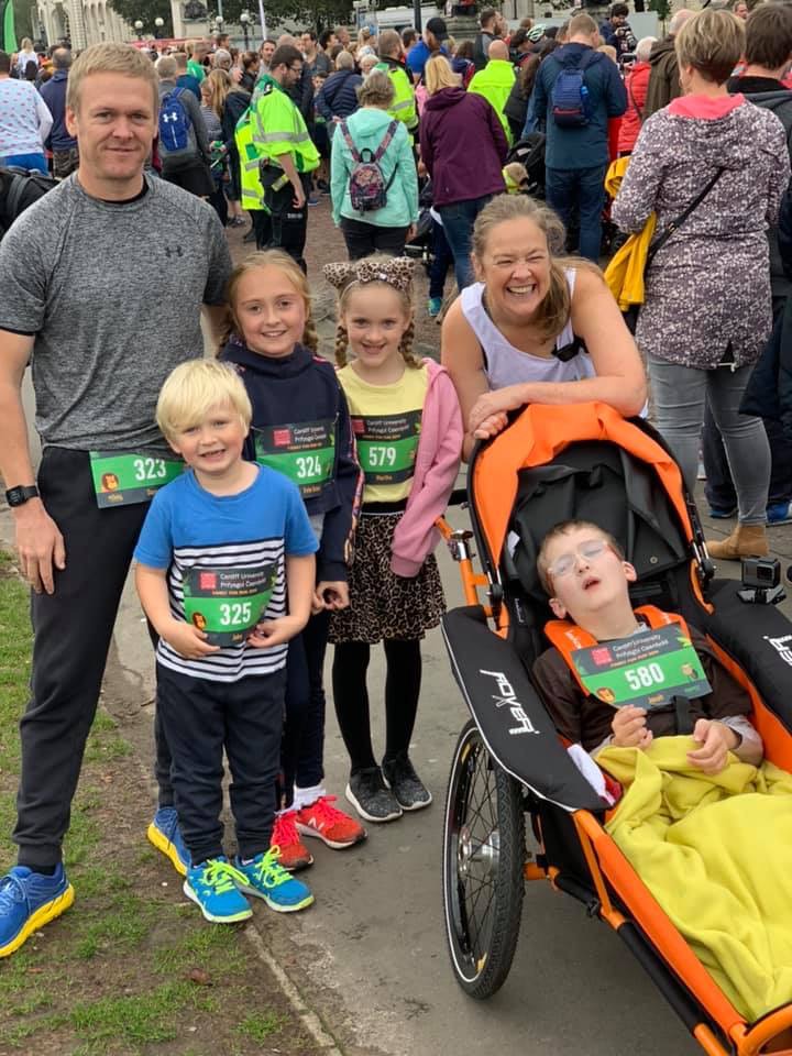 jonahjeffing's tweet photo. Jonah is away at respite at the moment and I'm really missing my run buddy! Here he is at our very first race with my little brother, my niece and nephew and Jonah's sister, Martha. #festivalofrunning #assistedrunning #inclusion https://t.co/4F793nCi8R