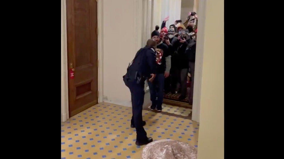 thehill's tweet photo. Senators introduce bill to award Officer Goodman the Congressional Gold Medal https://t.co/EEDwhqL2Uu https://t.co/pbrxf5DpKD