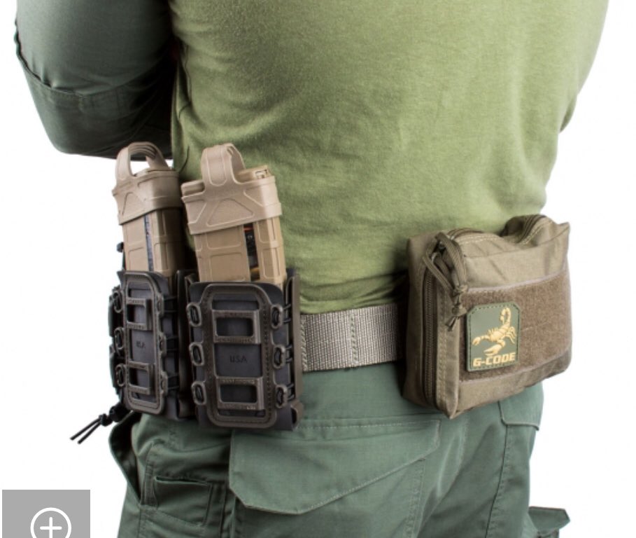  #Magnolia is wearing Scorpion G-code Softshell rifle packs on his belt.They appear to be empty. Usually used for AK, AR & 7.62x51 (.308) magazines.We know zip tie guy (Munchel) stashed weapons. Did Magnolia stash weapons too? https://www.tacticalholsters.com/product/2-pack-rifle-kit/