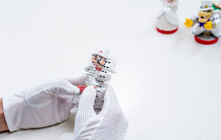 - Nintendo Switch thermal testing- Testing button durability- Nintendo hardware production line- amiibo quality control check