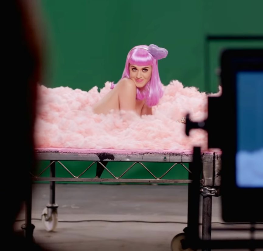 Wide Awake was a song written for Katy Perry's documentary, and navigates themes related to self-love and recovery. The story begins by showing Katy's positive self as she finishes filming the California Gurls MV.