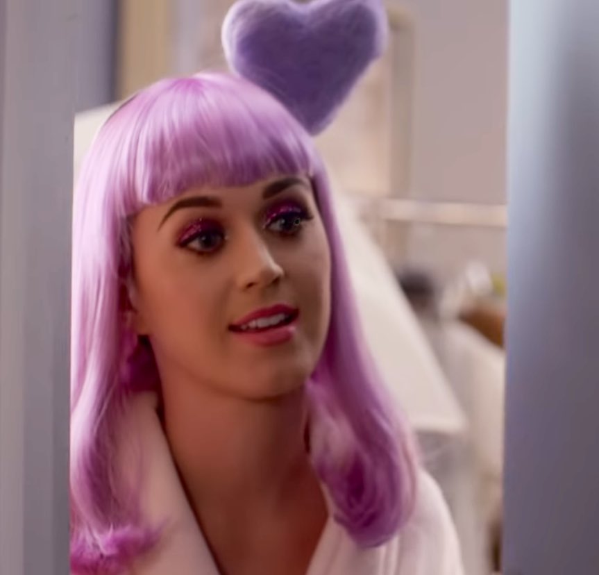 Wide Awake was a song written for Katy Perry's documentary, and navigates themes related to self-love and recovery. The story begins by showing Katy's positive self as she finishes filming the California Gurls MV.