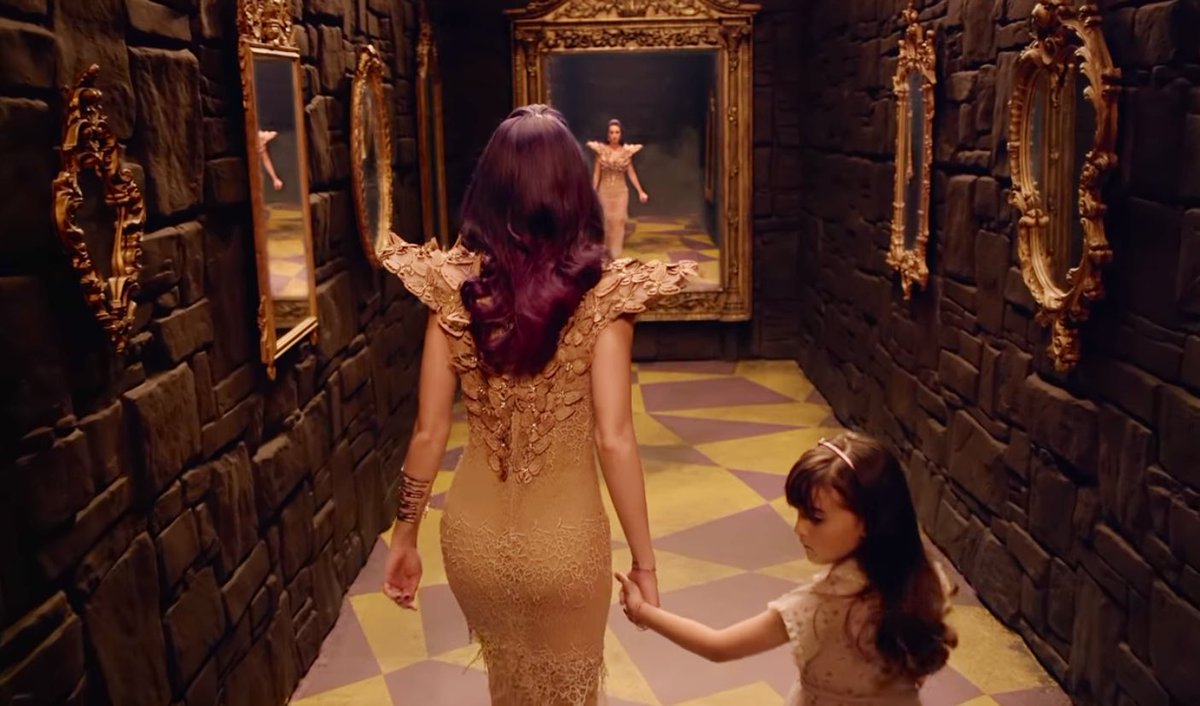 A new path opens up to reveal Katy's childhood self, who represents the innocence Katy lost growing up. They decide to navigate the maze together and find a way out.