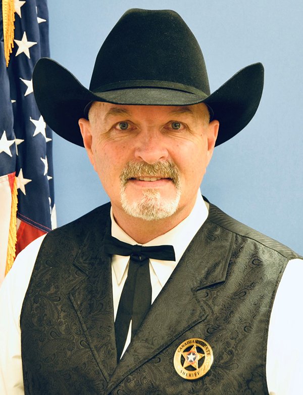 SHERIFF CHRIS WEST CANADIAN COUNTY, OK, attended "rally“ and posted on Facebook "I’m okay with using whatever means necessary to preserve America and save FREEDOM & LIBERTY… I want several in Congress… in prison, or worse.”