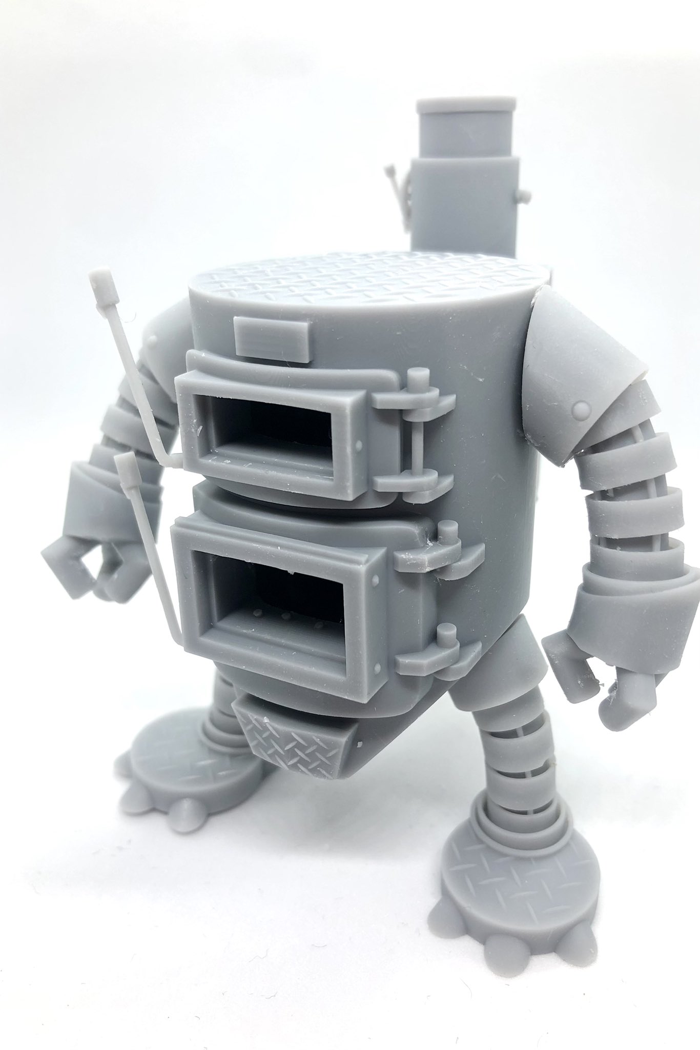 ロボット型薪ストーブ 商品紹介 ｜ 小磯鉄工