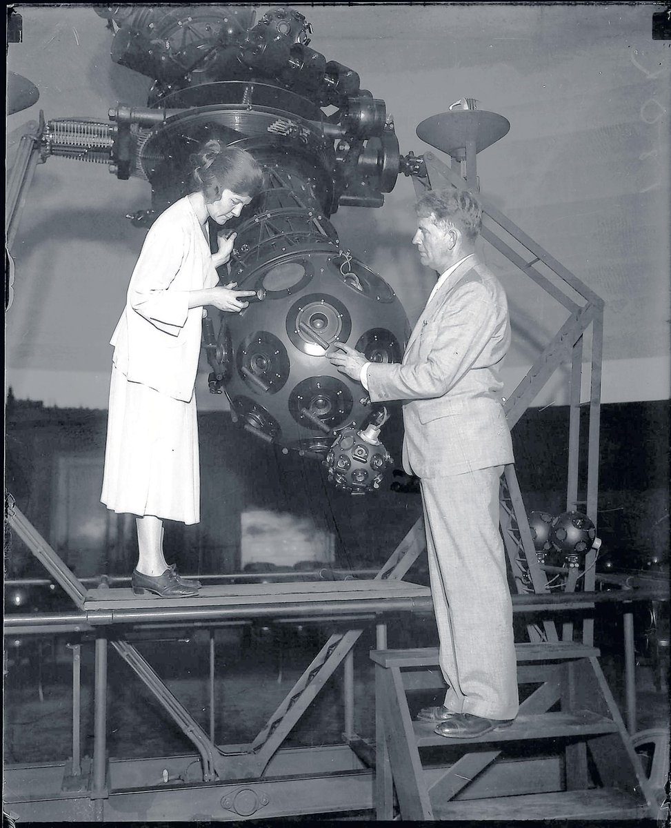 Front and center we find the meeting hosts, Philip Fox and Maude Bennot of the Adler Planetarium. Philip was the Adler's first Director, and at the time, Maude was his research assistant. 4/19