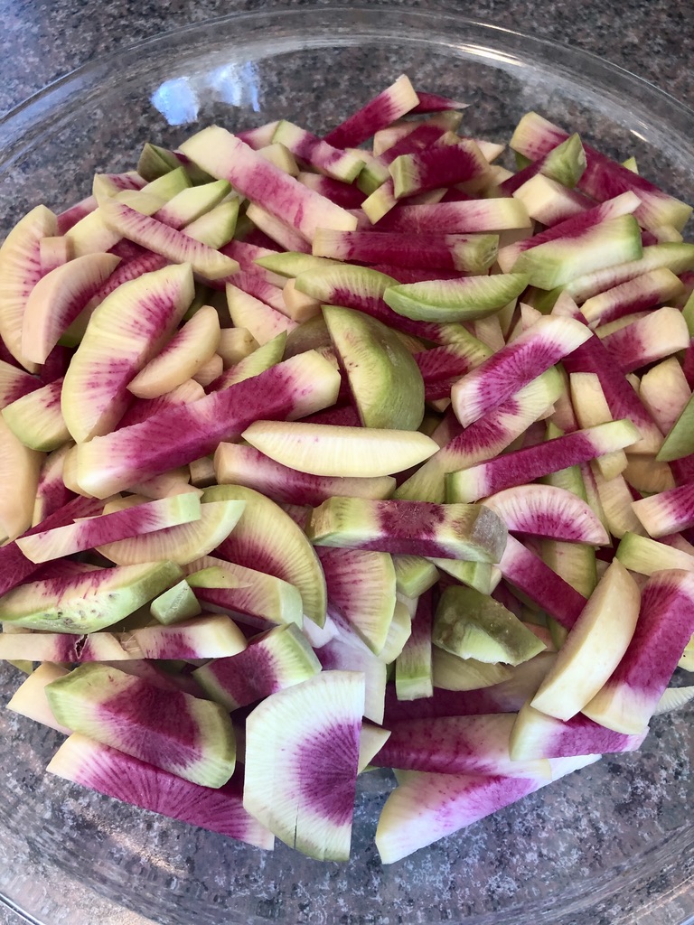 TexanInOz's tweet photo. I love watermelon radishes--an heirloom variety of daikon radish which originated in China. They are as tasty as they are beautiful. These are destined to be #lactoferment for snacking later. They are grown #Local &amp; #Organic #cooking https://t.co/ejnDd1ppwT