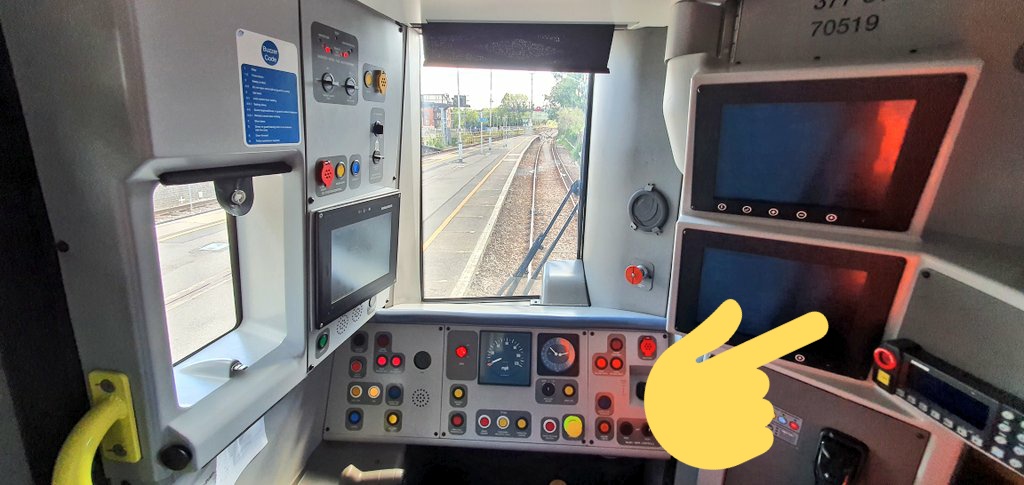 While the driver is setting up, we need to convert the cabs that have just attached, into a corridor. First the panel that has the DOO monitors and the GSM-R on it, swings across to the left.