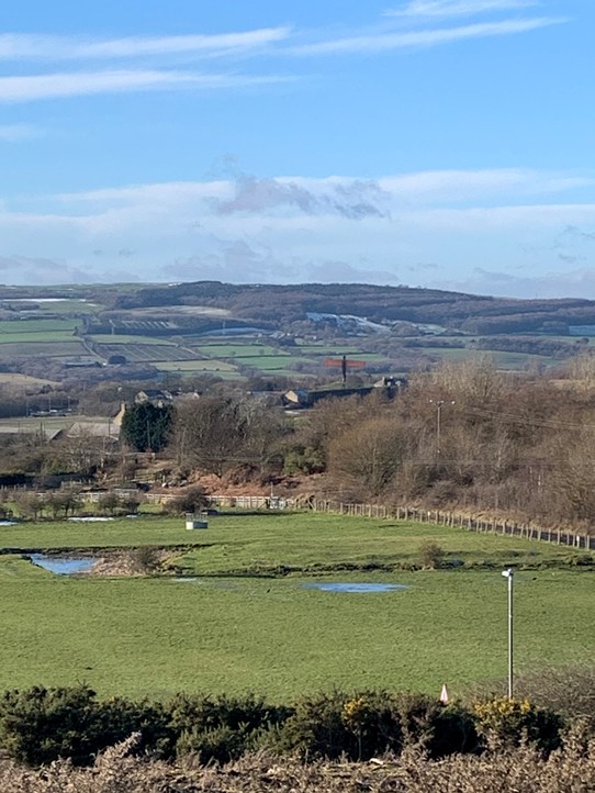 Looking west, the Angel of the North, Team Valley and beyond the Ravensworth Estate, once owned by the Liddell family which monopolised coal production locally in C18 & C19