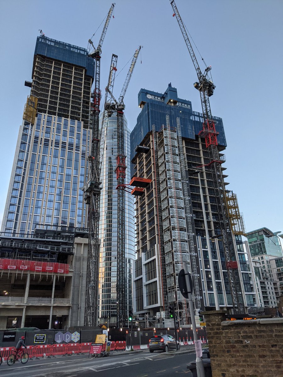 Two very tall towers (called One Nine Elms and occupying the site of the GMW-designed former Market Towers and Colosseum nightclub) are currently under construction by KPF... Earlier designs included a connecting sky lobby...