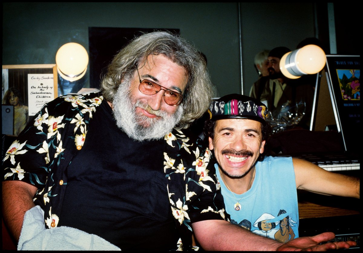 “I saw <a href="/SantanaCarlos/">Carlos Santana</a> walk into a dressing room, so I followed him in and Garcia was holding court. I asked for a shot of the two of them together which was quickly OK’d. They were old friends, it was fun to watch these legendary Fillmore era artists hang.” 
- @JayBlakesberg