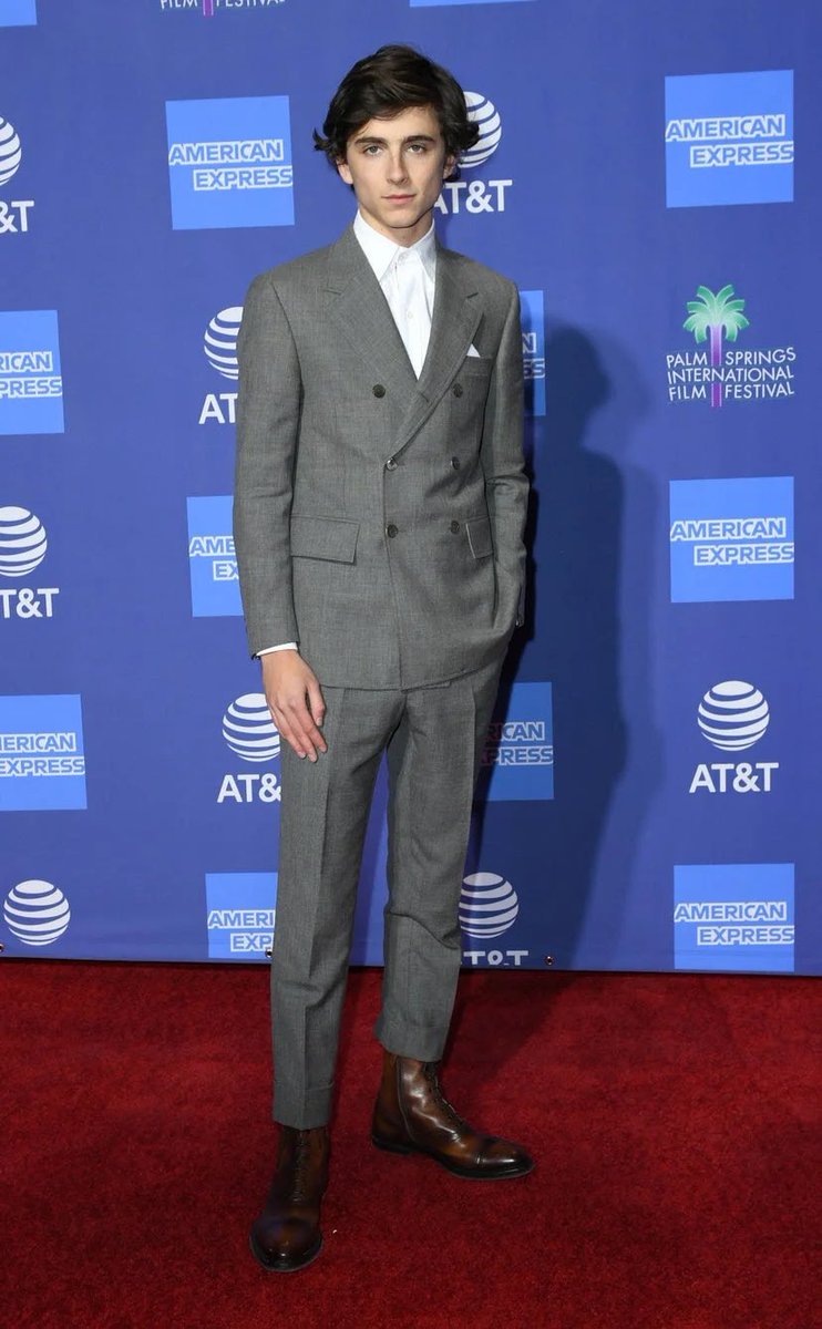 18 November 2018He wore Haider Ackermann for the 2018 Governors Awards in Hollywood.3 January 2019Timothée arrived for the 30th Annual Palm Springs International Film Festival Awards wearing a grey double-breasted suit with brown boots.