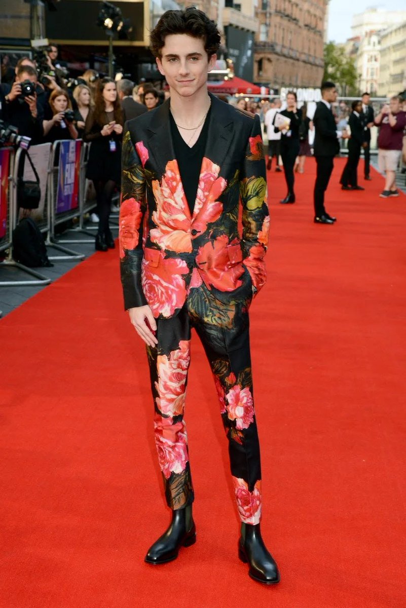 13 October 2018At the London premiere of Beautiful Boy, Timothée arrived wearing a floral suit by  @McQueen .4 November 2018Timothée chose a black suit worn with an embellished top by Louis Vuitton for the Hollywood Film Awards.
