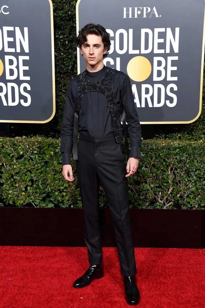 5 January 2019He attended a Bafta tea party in Los Angeles wearing a Raf Simons knit with indigo turn-up jeans.6 January 2019Timothée wore an embellished bib by Virgil Abloh for Louis Vuitton at the 2019 Golden Globes.
