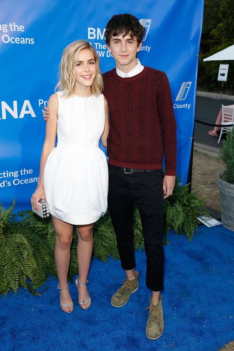 25 June 2015The actor collected a Saturn Award on behalf of Hans Zimmer wearing a black suit and a white (untucked) shirt.Timothée posed with Kiernan Shipka at a summer party wearing a burgundy knit jumper and camel desert boots.