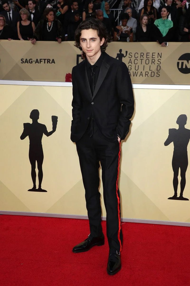 21 January 2018Timothée arrived at the SAG Awards wearing a custom  @CalvinKlein suit.24 January 2018In Rome, Timothée attended a Call Me By Your Name photocall wearing a  @ThomBrowneNY overcoat and lace-up boots.