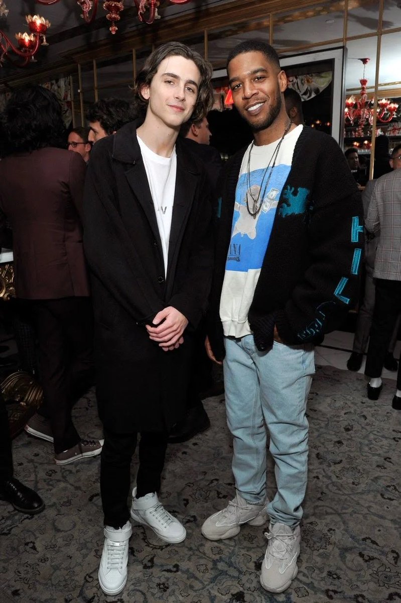 20 February 2018Timothée was photographed with Kid Cudi wearing a black and white outfit at a QG dinner held in his honour.3 March 2018He wore a satin bomber jacket for the Oscar nominees dinner.
