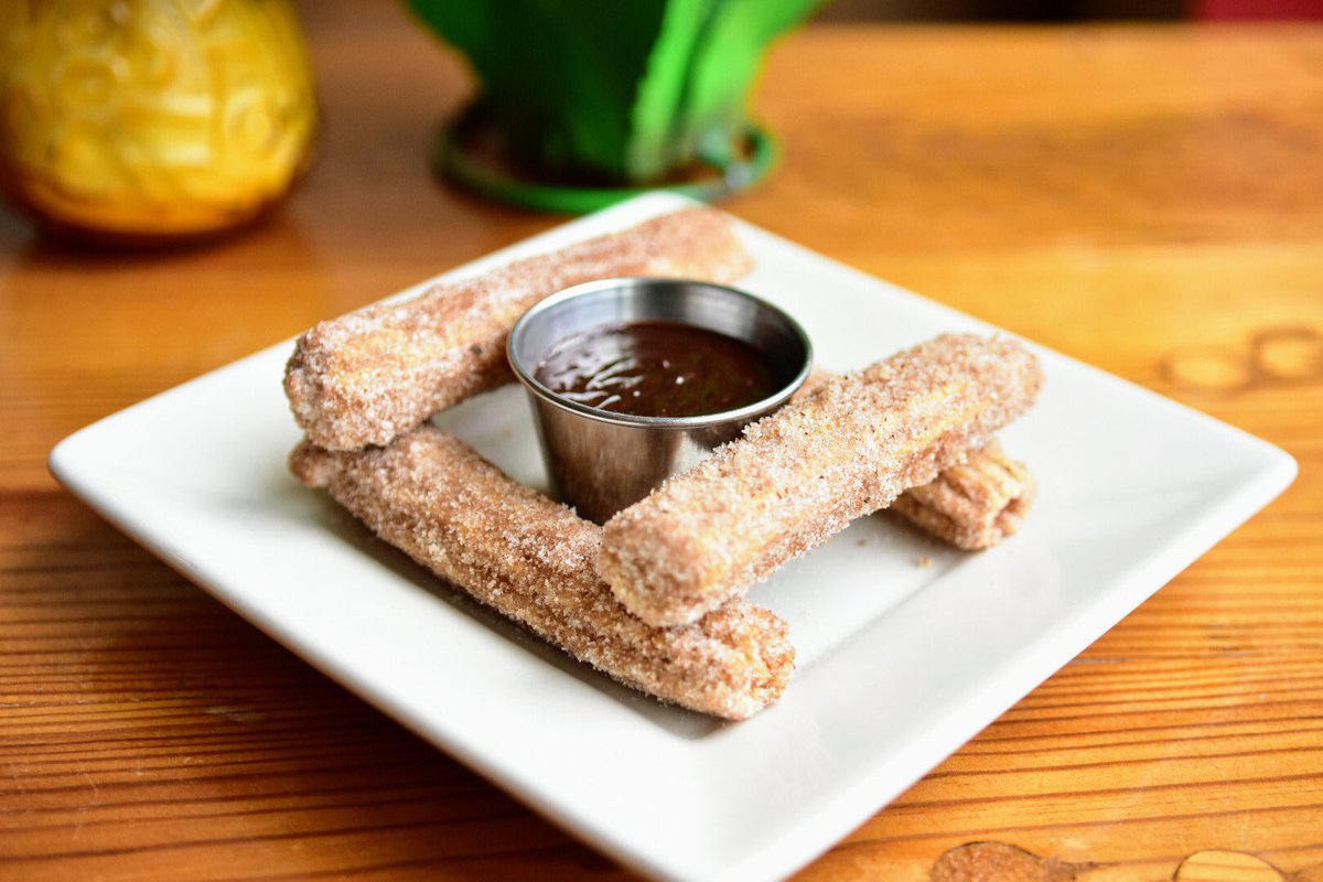 DosPerrosDurham's tweet photo. It’s always a good day for churros!

Crispy fried dough rolled in cinnamon sugar with delectable chocolate sauce. 

Can I get a “YUM?” 

#Churros
#EatLocal
#DurhamTakeoutChallenge￼ 
#DurhamNC
#DiscoverDurham
#TriangleFoodies https://t.co/p6oj5WUK19