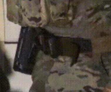 Magnolia’s belt has been IDed.Eagle Industries Operator Gun Belt with MOLLE attachment. Costs about $120.The holster appears empty but could carry a firearm or airsoft equally. Likely not a taser.Great job! Keep going!  https://eagleindustries.com/operators-gun-belt-with-molle-attachment/